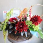 展示会　開催お祝いのアレンジメント